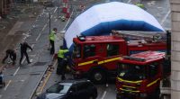 The scene in Water Street after a car collided with Liverpool supporters