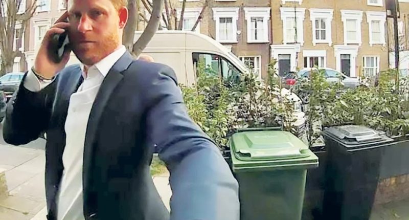 Prince Harry on a phone call, knocking on a door in Fulham.