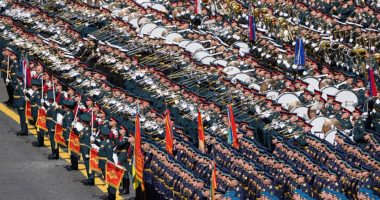 Military band playing in Red Square during a Victory Day parade.