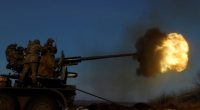 Ukrainian soldiers firing an anti-aircraft weapon in Bakhmut.