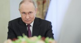 Vladimir Putin at a meeting.