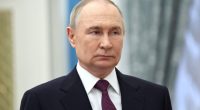 Vladimir Putin at an award presentation.