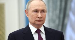 Vladimir Putin at an award presentation.