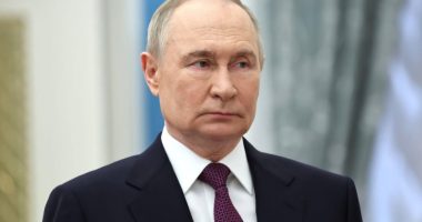 Vladimir Putin at an award presentation.