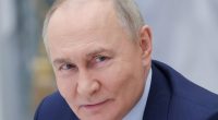 Close-up portrait of Vladimir Putin.