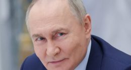 Close-up portrait of Vladimir Putin.