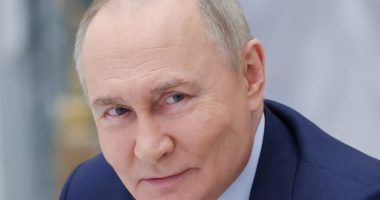Close-up portrait of Vladimir Putin.