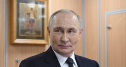 Vladimir Putin in a suit.