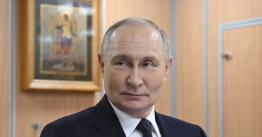 Vladimir Putin in a suit.
