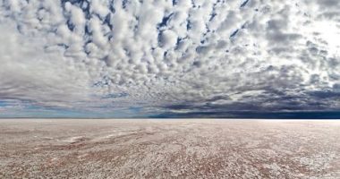 ï»¿Kati Thanda-Lake Eyre is a dry salt bed in the lowest point in Australia, sitting 15 metres below sea level, and covers about 9500 square kilometres.