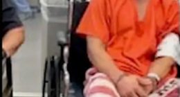 Injured inmate in wheelchair.
