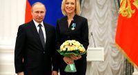 Maria Zakharova and Vladimir Putin.