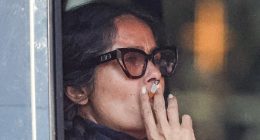 Salma Hayek puffs on a cigarette while stuck in traffic