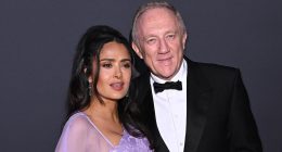 Salma Hayek wows in a caped lilac gown as she cosies up to husband