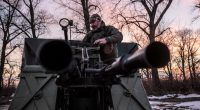 Ukrainian serviceman operating an anti-aircraft machine gun.