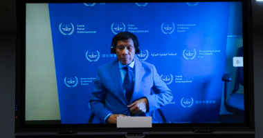 Strongman ex-leader wins landslide vote - while on trial at the Hague