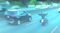 Dashcam footage of a minivan hitting a motorcyclist.