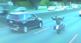 Dashcam footage of a minivan hitting a motorcyclist.