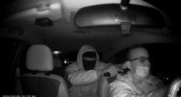 Night vision image of a carjacking.