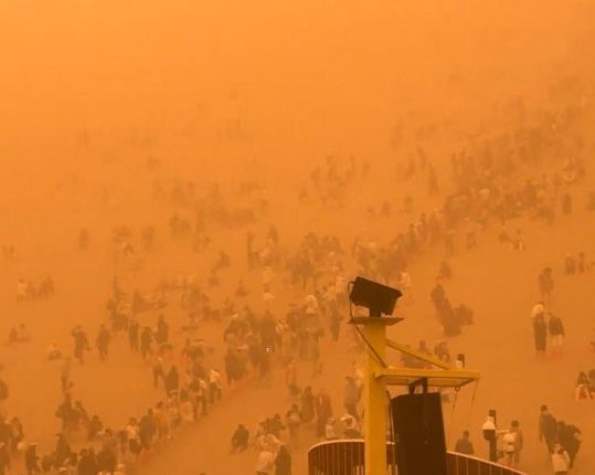 Tourists stranded in a severe sandstorm in Dunhuang, China.