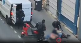 Footage of three masked men forcing a woman into a van.