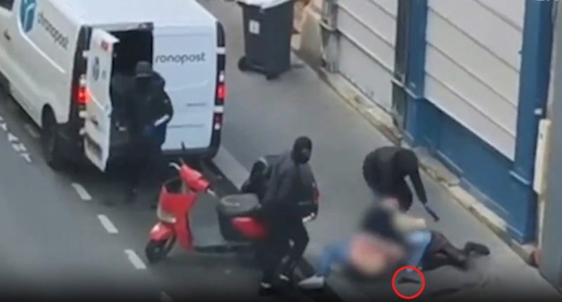 Footage of three masked men forcing a woman into a van.
