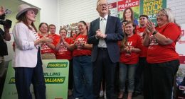 Australian Prime Minister Anthony Albanese alongside Labor's Candidate for Dickson, Ali France (L) visit a campaign office in the suburb of Strathpine on May 02, 2025 in Brisbane, Australia.