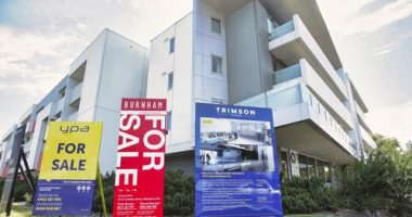 For sale signs outside a Melbourne apartment.