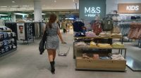 A woman shops in an M&S store