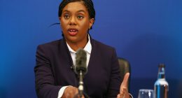 Kemi Badenoch speaking at a press conference.