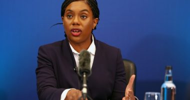 Kemi Badenoch speaking at a press conference.