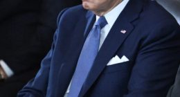 President Biden seated at an inauguration ceremony.