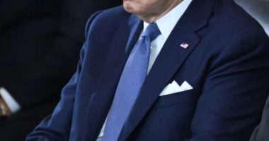 President Biden seated at an inauguration ceremony.