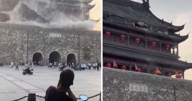 This screengrab taken from a video shows roof tiles collapsing from a centuries-old Chinese drum tower in Anhui, China, on May 19, 2025.