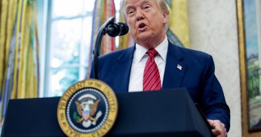 President Trump speaking at a podium in the Oval Office.