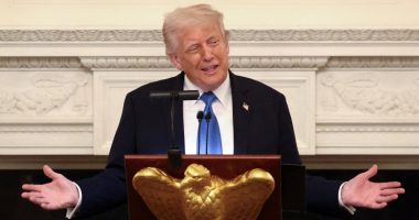 President Donald Trump speaking at a podium.