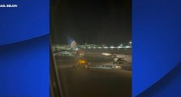 Screenshot of two United Airlines planes with colliding wingtips; no injuries reported.
