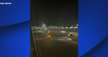 Screenshot of two United Airlines planes with colliding wingtips; no injuries reported.