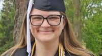 Photo of Kelsie Martin in graduation attire.
