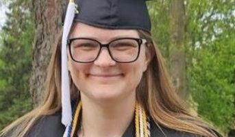 Photo of Kelsie Martin in graduation attire.