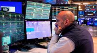 A trader works on the floor of the New York Stock Exchange