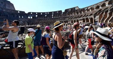Tourists at the Colosseum in Rome.