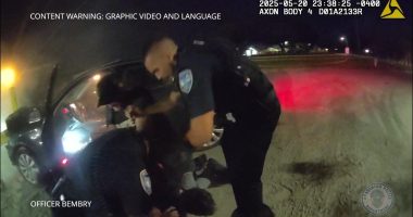 WATCH: Bradenton police officer pinned against dashboard as driver speeds off