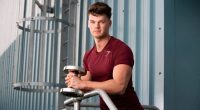An image collage containing 1 images, Image 1 shows Ben Francis, founder of Gymshark, holding a dumbbell
