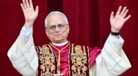Newly elected Pope Leo XIV, Robert Prevost, waving to the crowd.