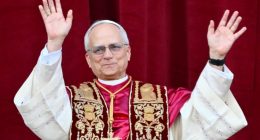 Newly elected Pope Leo XIV, Robert Prevost, waving to the crowd.