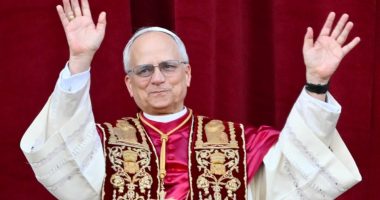 Newly elected Pope Leo XIV, Robert Prevost, waving to the crowd.