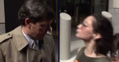 Woman charged with spitting on then-US attorney