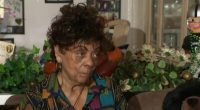 A 76-year-old woman being interviewed, unable to obtain a driver's license due to missing documentation.
