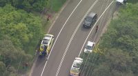 An eight-year-old is fighting for life after being struck by a car in Sydney's north